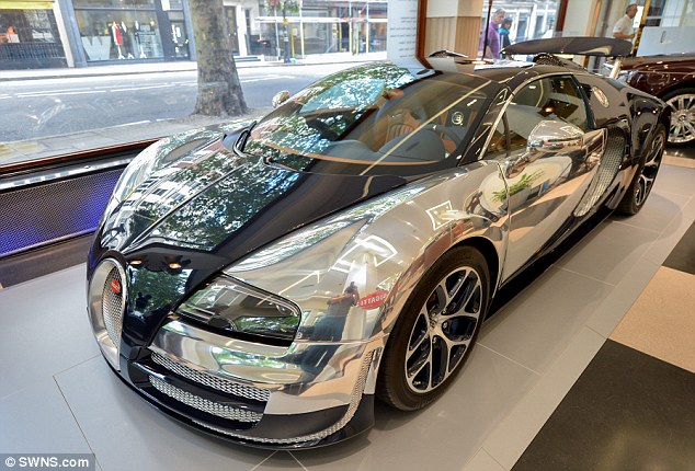 1408721438551_wps_4_The_Bugatti_Veyron_reflec